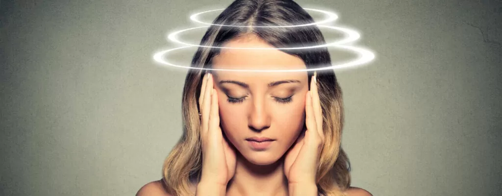 A woman having vertigo